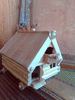 Игрушка Передвижной деревянный домик